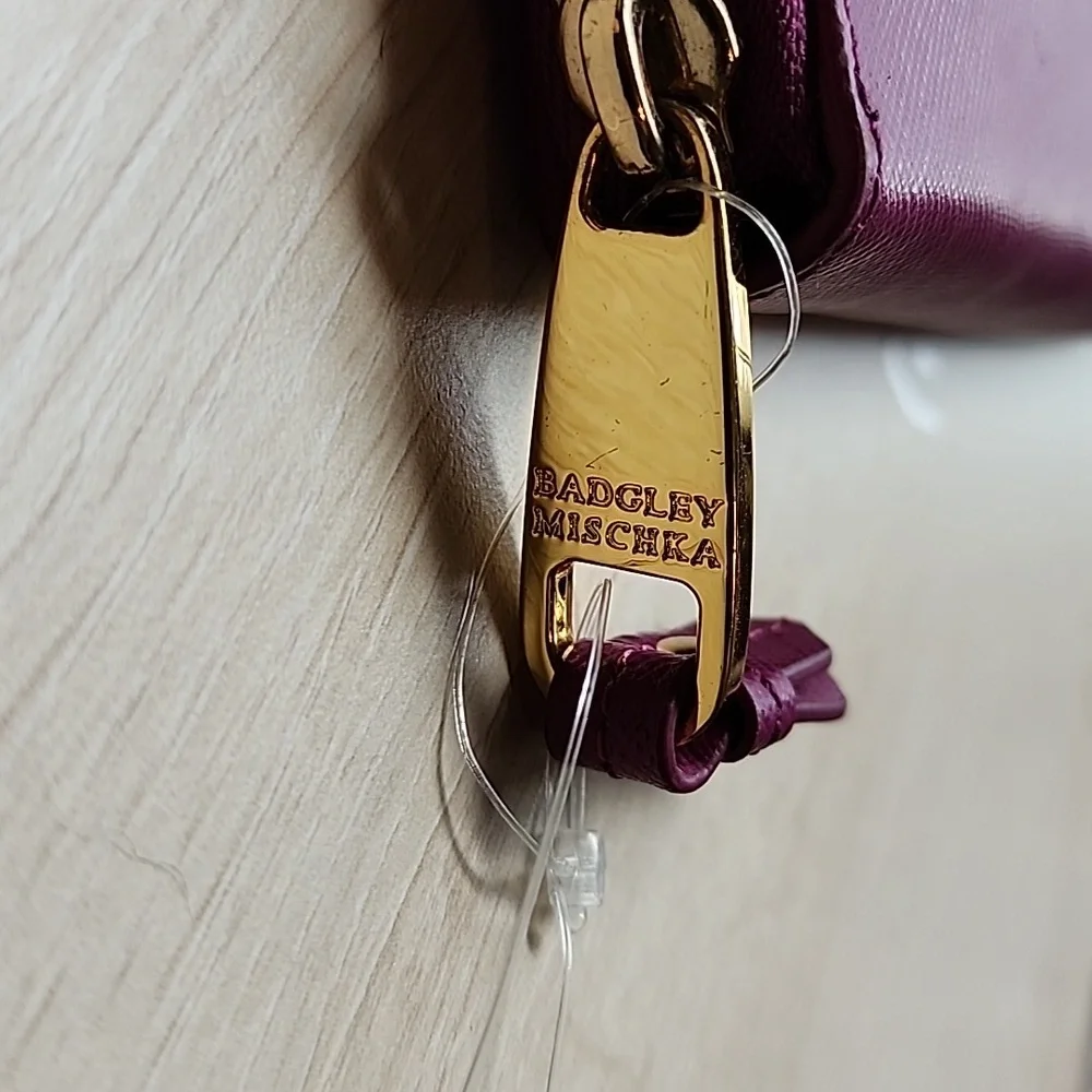EUC‎ Badgley Mischka Plum/fuschia wallet